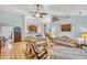 Spacious living room with hardwood floors, neutral walls, and comfortable seating at 2851 Curran Pl, Mount Pleasant, SC 29466