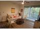 Comfortable living room with sliding glass doors to balcony at 1600 Long Grove Dr # 628, Mount Pleasant, SC 29464