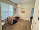 Bright bonus room with large windows and hardwood floors at 1600 Long Grove Dr # 628, Mount Pleasant, SC 29464