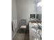 Clean bathroom with double vanity and granite countertops at 1600 Long Grove Dr # 628, Mount Pleasant, SC 29464