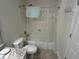 Bathroom with tub shower, toilet and granite vanity at 1600 Long Grove Dr # 628, Mount Pleasant, SC 29464