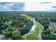 Aerial view showing home's location on marsh with private dock at 3 Brockman Dr, Charleston, SC 29412