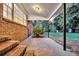 Covered patio with brick steps, offering a view of the backyard at 598 Maple Branch Rd, Reevesville, SC 29471