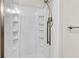 Clean shower with glass enclosure and built-in shelving at 598 Maple Branch Rd, Reevesville, SC 29471