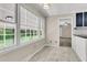 Bright breakfast nook boasts large windows offering ample natural light and backyard views at 598 Maple Branch Rd, Reevesville, SC 29471