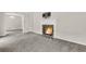 Living room with fireplace and carpet flooring at 598 Maple Branch Rd, Reevesville, SC 29471