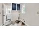 Laundry room with built-in cabinets and access to a small bathroom at 598 Maple Branch Rd, Reevesville, SC 29471
