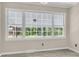 Breakfast nook features a wall of windows overlooking the backyard at 598 Maple Branch Rd, Reevesville, SC 29471