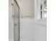Bright bathroom with shower stall and window at 598 Maple Branch Rd, Reevesville, SC 29471