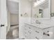 Bathroom with white vanity, marble countertop, and walk-in shower at 598 Maple Branch Rd, Reevesville, SC 29471