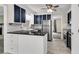 Updated kitchen with dark blue cabinets, granite countertops, and stainless steel appliances at 598 Maple Branch Rd, Reevesville, SC 29471
