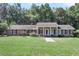 Brick home with covered porch and landscaped yard at 598 Maple Branch Rd, Reevesville, SC 29471