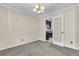 Dining room with chandelier and French doors to kitchen at 598 Maple Branch Rd, Reevesville, SC 29471
