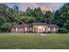 Brick ranch house with a large front yard at 598 Maple Branch Rd, Reevesville, SC 29471