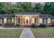 Covered porch with terracotta tile and white columns at 598 Maple Branch Rd, Reevesville, SC 29471