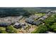Aerial view showcasing community layout, landscaping, and water views at 301 Longshore St # 423, Charleston, SC 29492