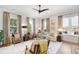Spacious living room with hardwood floors, a neutral color palette, and ample natural light at 301 Longshore St # 423, Charleston, SC 29492