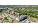 Aerial view of community featuring various architectural styles and a pool at 301 Longshore St # 423, Charleston, SC 29492