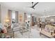 Open living area with comfortable furniture and a view into the kitchen and dining area at 301 Longshore St # 423, Charleston, SC 29492