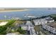 Aerial view of waterfront community with boat slips and nearby buildings at 301 Longshore St # 423, Charleston, SC 29492
