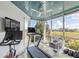 Home gym with a treadmill, stationary bike, and scenic views at 228 Haddrell St, Mount Pleasant, SC 29464
