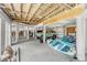 Large unfinished garage with room for multiple vehicles and equipment at 228 Haddrell St, Mount Pleasant, SC 29464