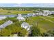 Aerial view of waterfront home with private dock and marsh views at 228 Haddrell St, Mount Pleasant, SC 29464
