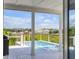 Relaxing pool and spa with a waterfront view, accessed from a spacious deck at 228 Haddrell St, Mount Pleasant, SC 29464