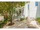 Landscaped front yard with walkway and seating area at 228 Haddrell St, Mount Pleasant, SC 29464