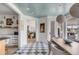 Open dining area with checkerboard floor and kitchen access at 228 Haddrell St, Mount Pleasant, SC 29464