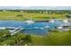 Drone view of boats docked at a pier next to marsh at 228 Haddrell St, Mount Pleasant, SC 29464