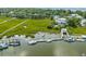 Aerial view of waterfront home with private dock and boats at 228 Haddrell St, Mount Pleasant, SC 29464