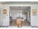 Modern kitchen with white cabinets, a light wood island, and blue range at 228 Haddrell St, Mount Pleasant, SC 29464