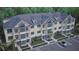 Exterior view of a multi-unit building with parking at 7421 Indigo Palms Way, Johns Island, SC 29455