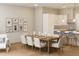 Open concept dining area with kitchen and living room views at 7421 Indigo Palms Way, Johns Island, SC 29455