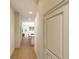 Long hallway leading to living areas and bedrooms at 7421 Indigo Palms Way, Johns Island, SC 29455