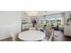 Bright dining area with a round table and chairs, open to the living area at 1044 Lovebug Ln, Summerville, SC 29485