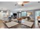 Open dining area with a view into the living room and kitchen at 1443 Cambridge Lakes Dr, Mount Pleasant, SC 29464