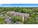 Brick apartment building with a pond and lush green surroundings at 1443 Cambridge Lakes Dr, Mount Pleasant, SC 29464