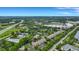 Wide aerial view of apartment community near highway and lush greenery at 1443 Cambridge Lakes Dr, Mount Pleasant, SC 29464