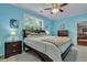 Spacious bedroom with a ceiling fan, large window and ample closet space at 1443 Cambridge Lakes Dr, Mount Pleasant, SC 29464