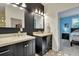 Double vanity bathroom with marble countertops and hexagon tile floors at 1443 Cambridge Lakes Dr, Mount Pleasant, SC 29464