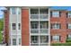 Three-story building showcasing multiple screened balconies at 1443 Cambridge Lakes Dr, Mount Pleasant, SC 29464