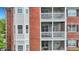 Three-story building showcasing multiple screened balconies at 1443 Cambridge Lakes Dr, Mount Pleasant, SC 29464