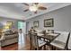 Bright dining area with hardwood floors and a wood dining table at 1443 Cambridge Lakes Dr, Mount Pleasant, SC 29464