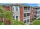 Brick building with multiple balconies and lush landscaping at 1443 Cambridge Lakes Dr, Mount Pleasant, SC 29464