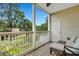 Screened porch with seating area and a pond view at 1443 Cambridge Lakes Dr, Mount Pleasant, SC 29464