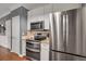 Modern kitchen features stainless steel appliances and granite countertops at 1443 Cambridge Lakes Dr, Mount Pleasant, SC 29464