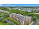 Aerial view of a multi-Gathering building near a canal and lush green areas at 1443 Cambridge Lakes Dr, Mount Pleasant, SC 29464