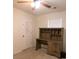 Well-lit bedroom with a desk and built-in shelving unit at 217 Pink Azalea St, Summerville, SC 29485